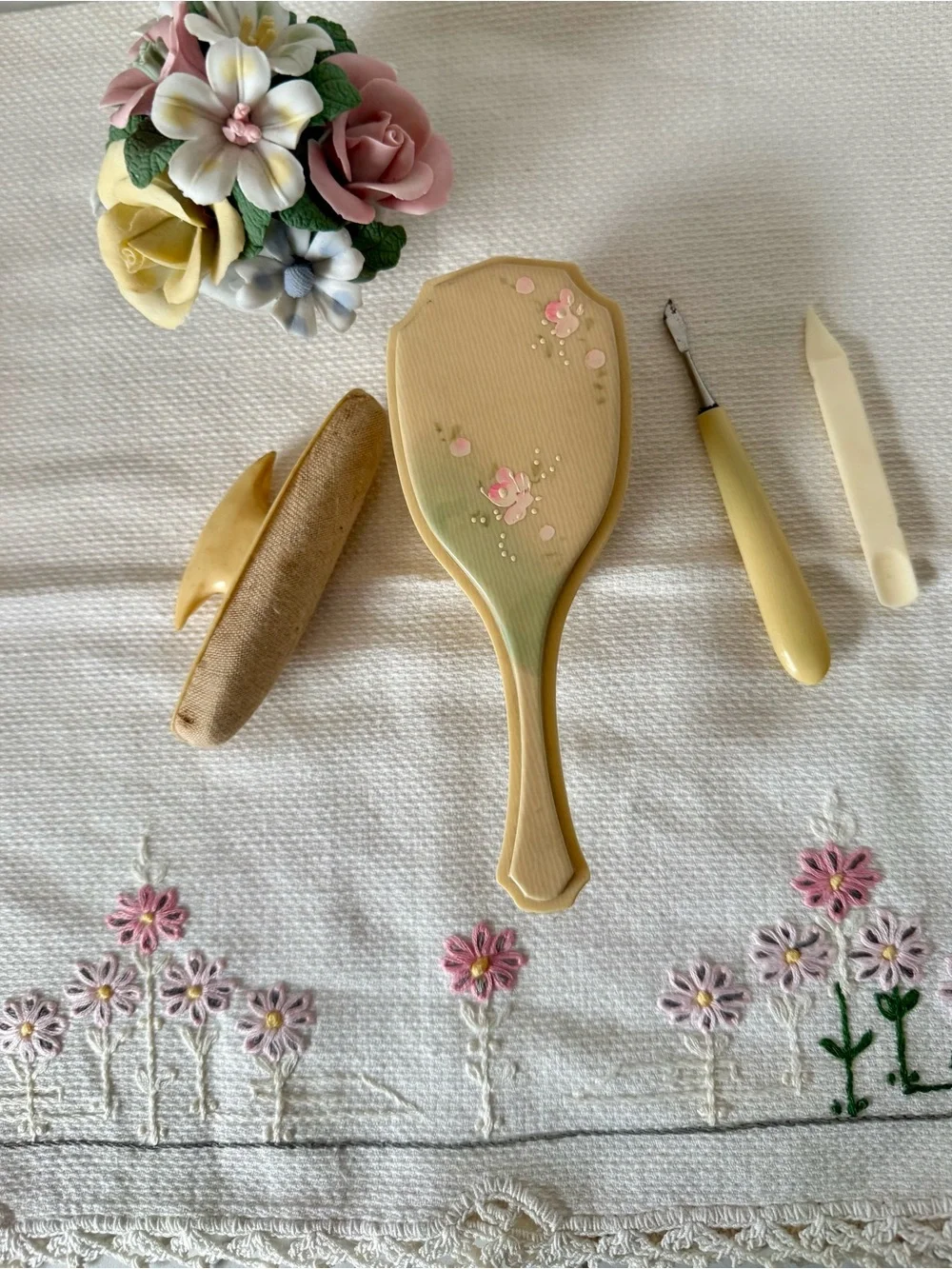 Celluloid child's hairbrush hand-painted floral design, circa 1920s-1930s